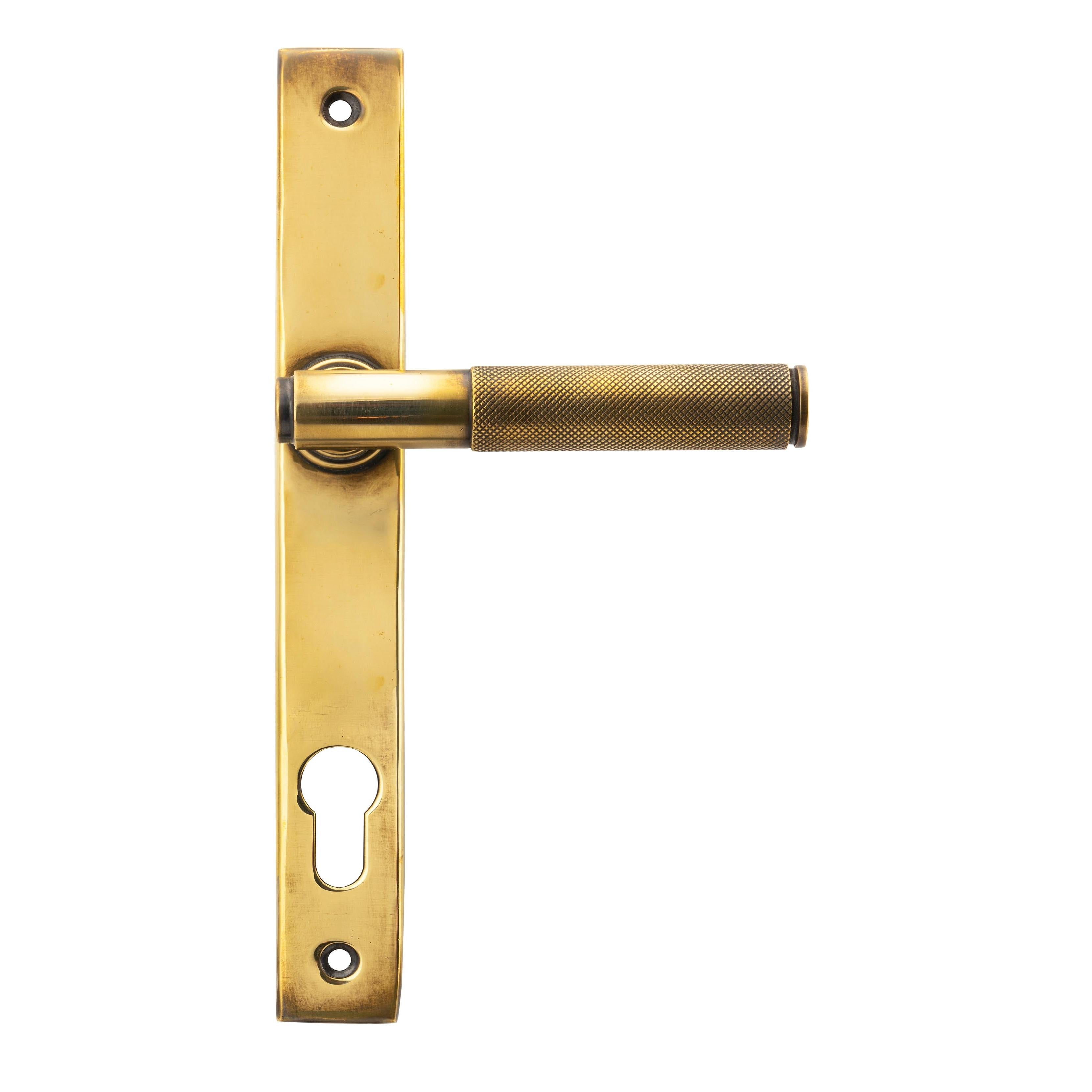 From The Anvil's Aged Brass Brompton Slimline Lever Espag. Lock Set