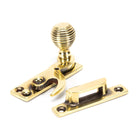 From The Anvil's Aged Brass Beehive Sash Hook Fastener