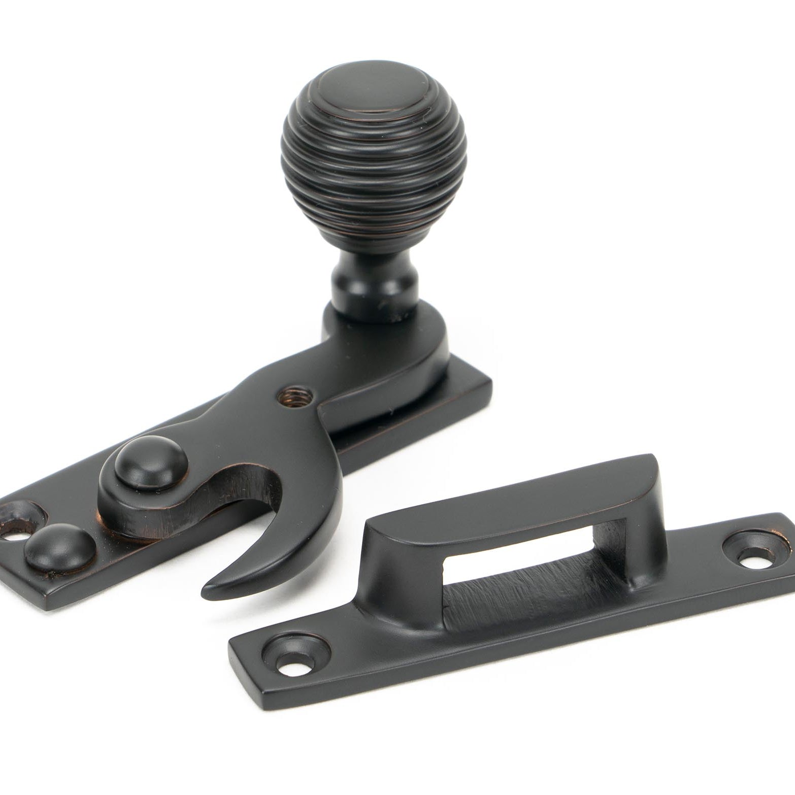 From The Anvil's Aged Bronze Beehive Sash Hook Fastener