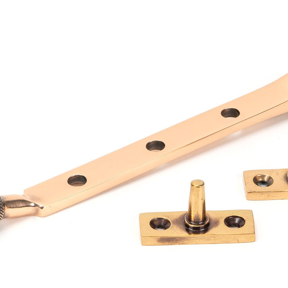 From The Anvil's Polished Bronze Brompton Stay