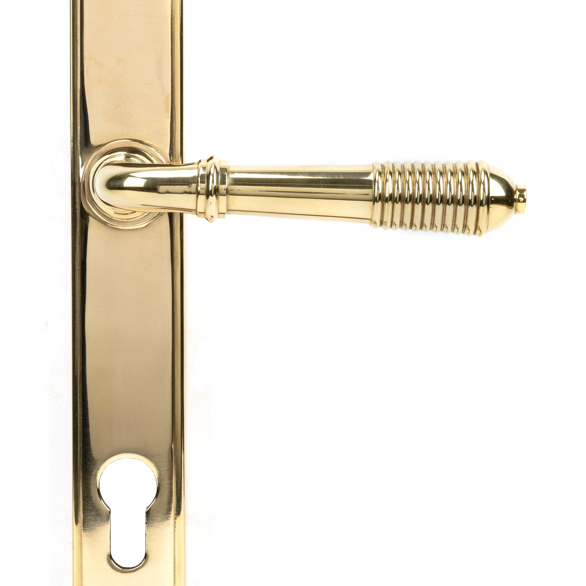 From The Anvil's Polished Brass Reeded Slimline Lever Espag. Lock Set