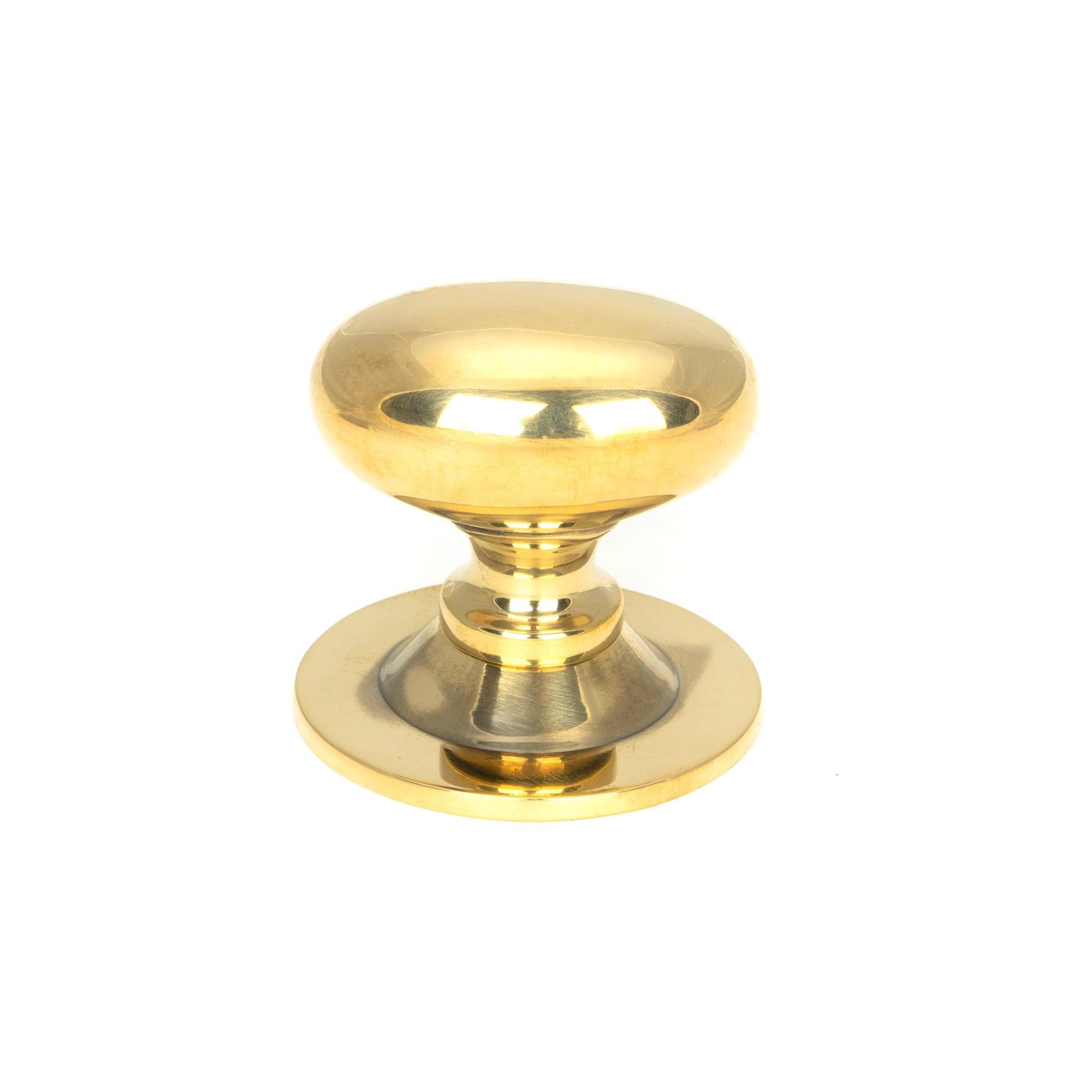 From The Anvil's Aged Brass Oval Cabinet Knob