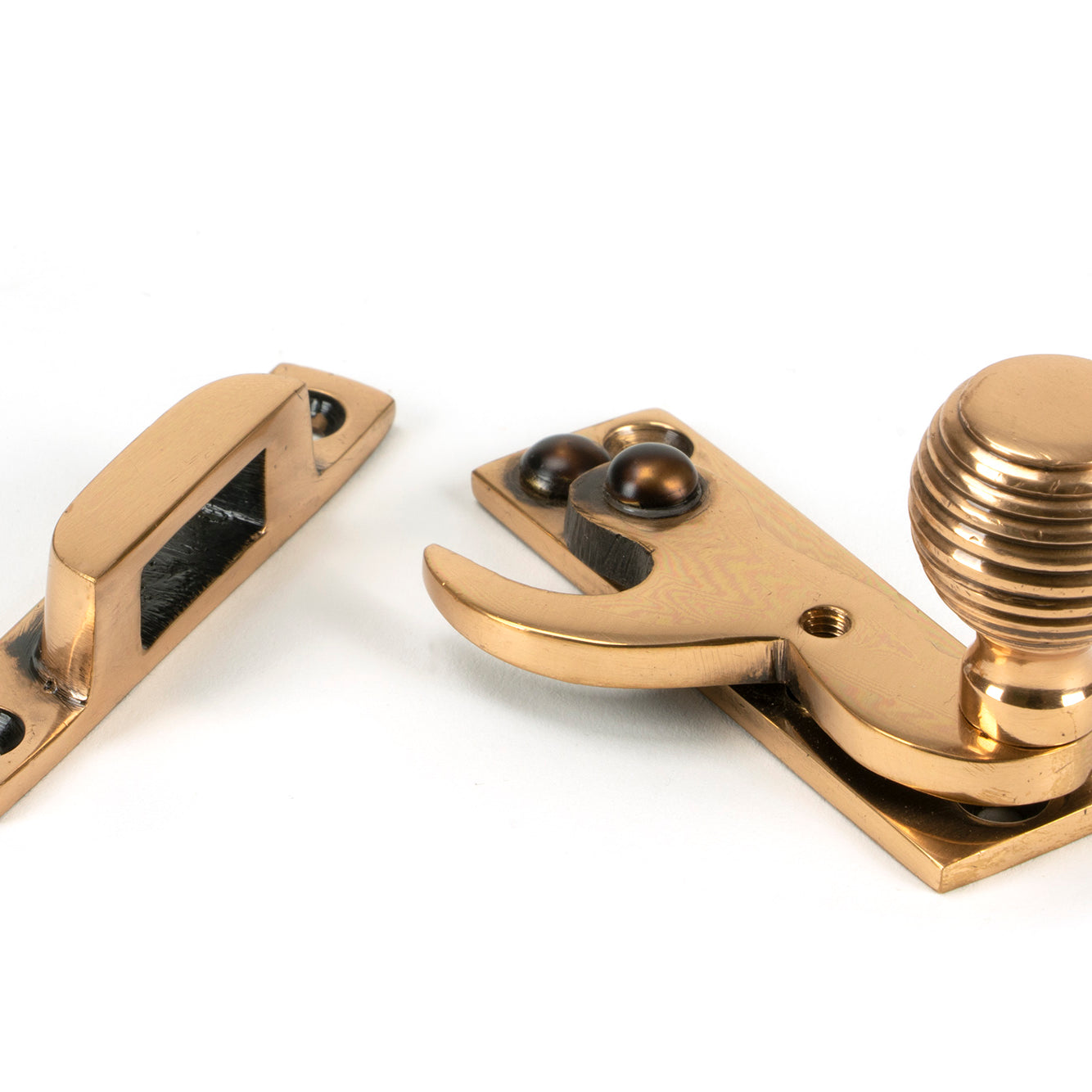 From The Anvil's Polished Bronze Beehive Sash Hook Fastener