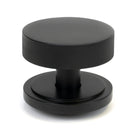 From The Anvil's Matt Black Brompton Centre Door Knob
