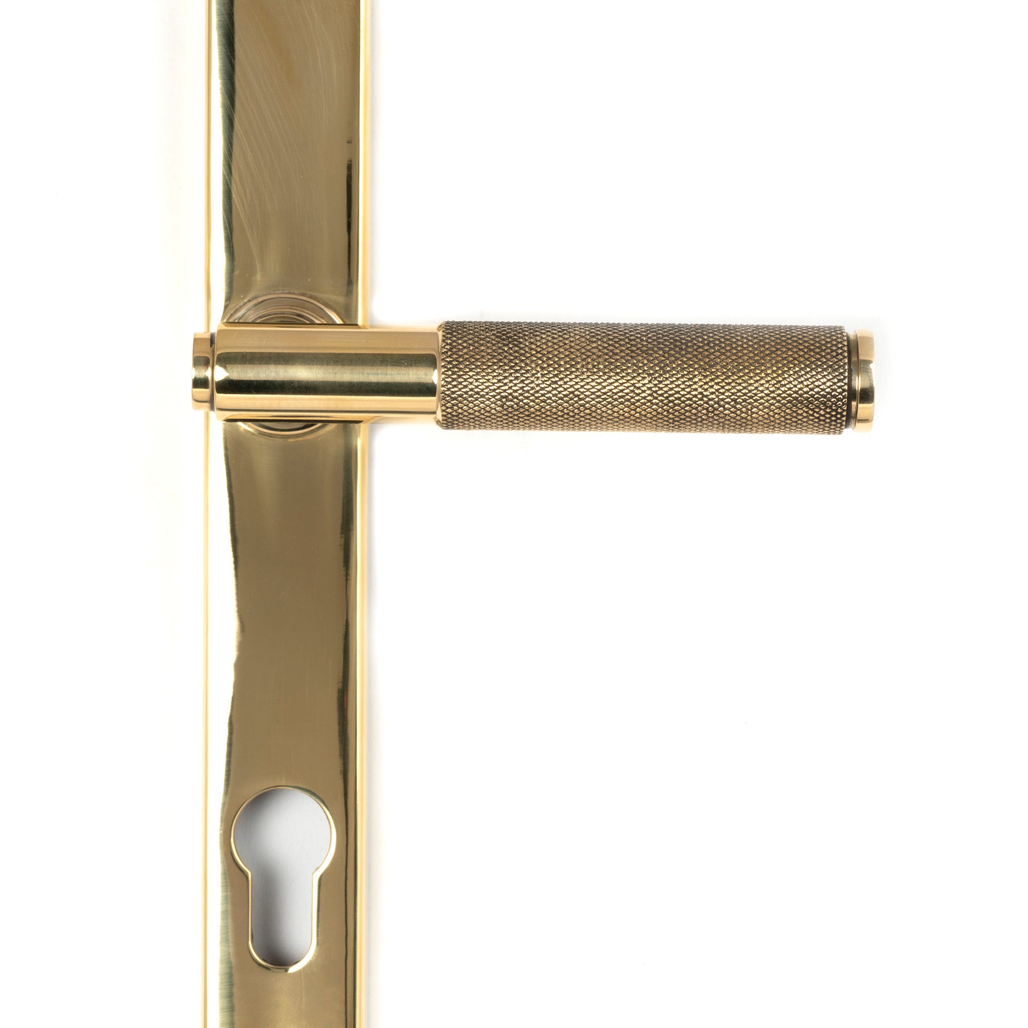 From The Anvil's Polished Brass Brompton Slimline Lever Espag. Lock Set