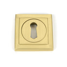 From The Anvil's Satin Brass Round Escutcheon