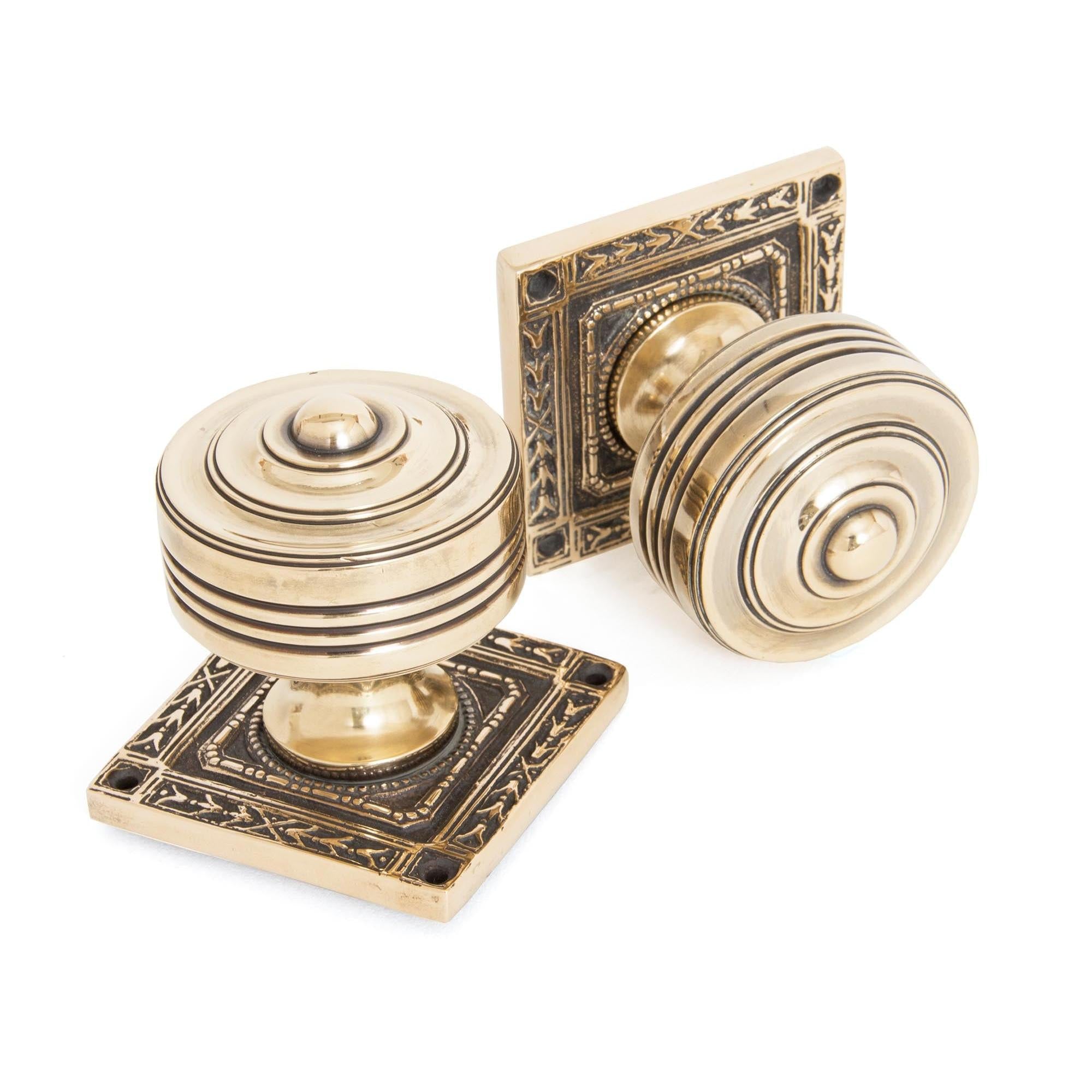 From The Anvil's Aged Brass Tewkesbury Square Mortice Knob Set