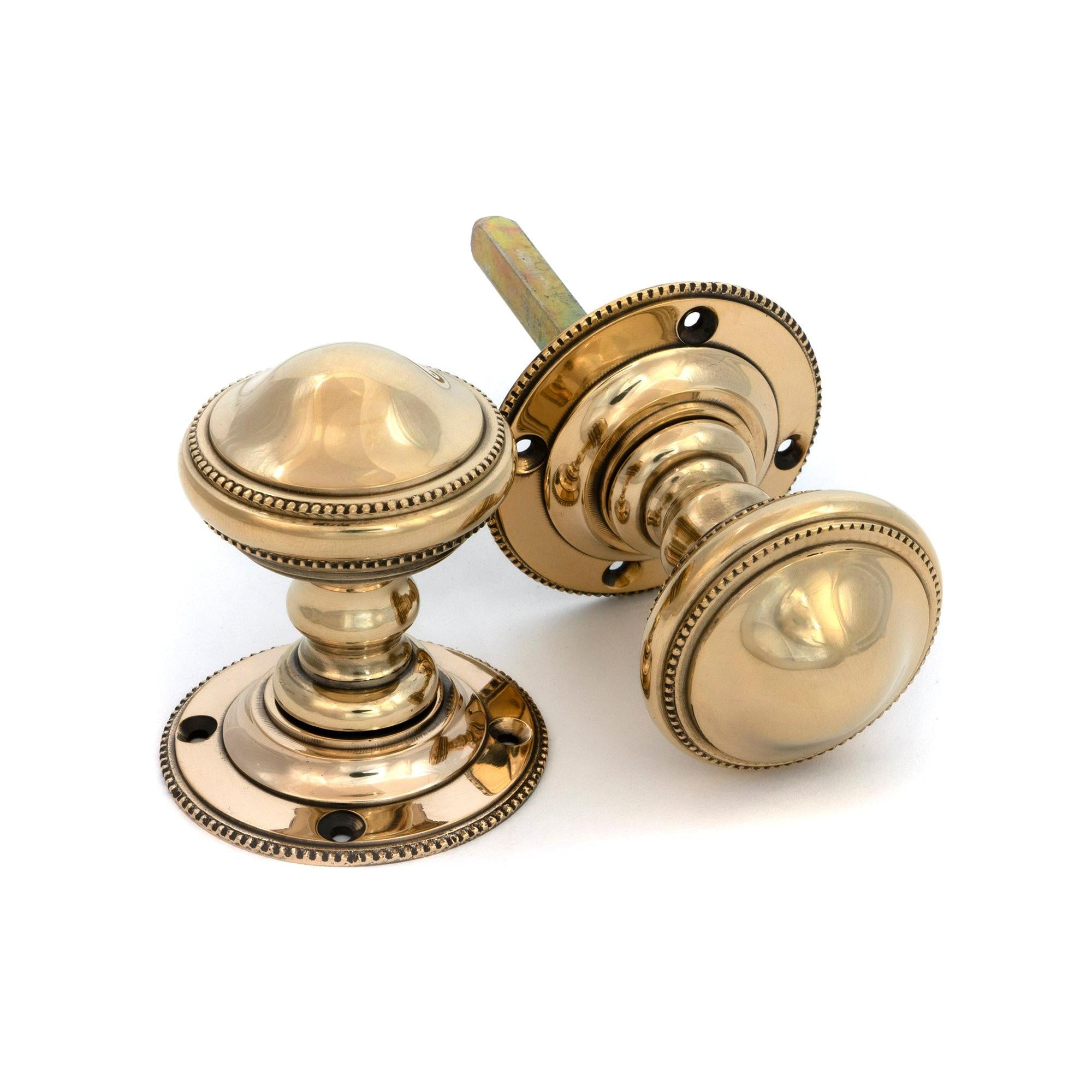 From The Anvil's Aged Brass Brockworth Mortice Knob Set