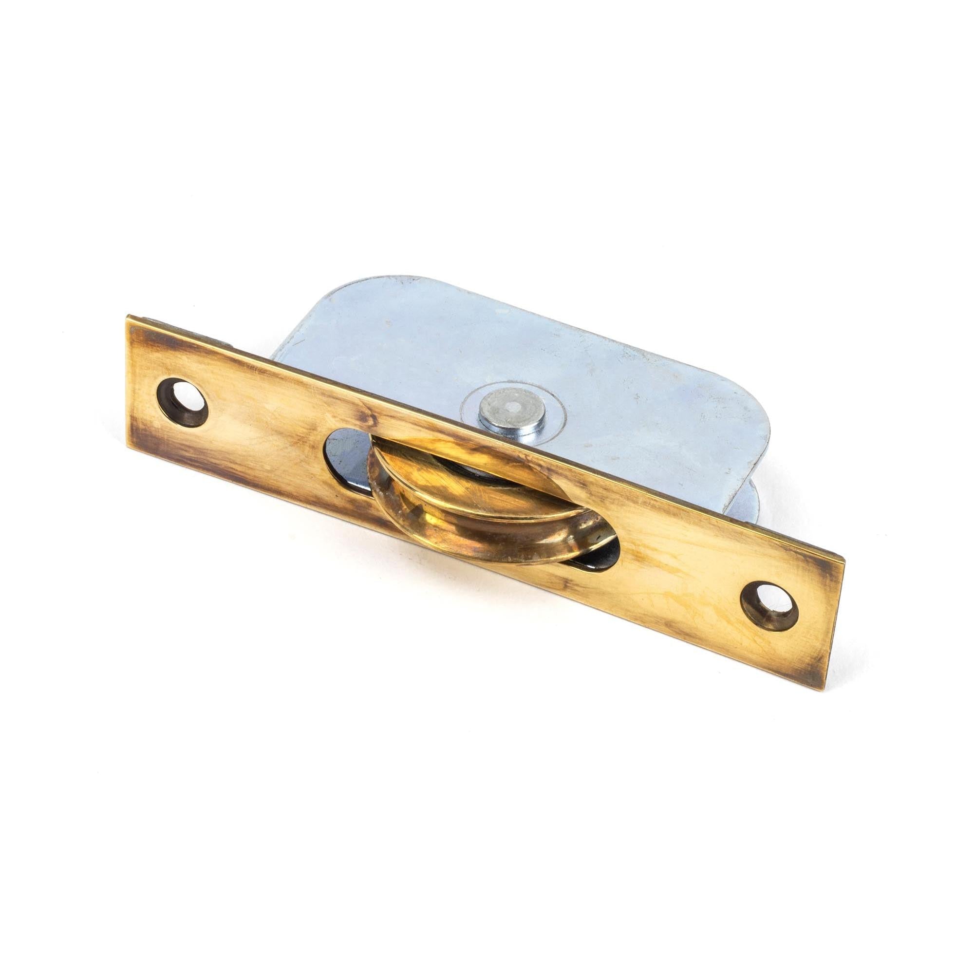 From The Anvil's Aged Brass Square Ended Sash Pulley 75kg