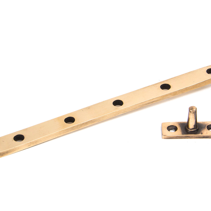 From The Anvil's Polished Bronze Reeded Stay