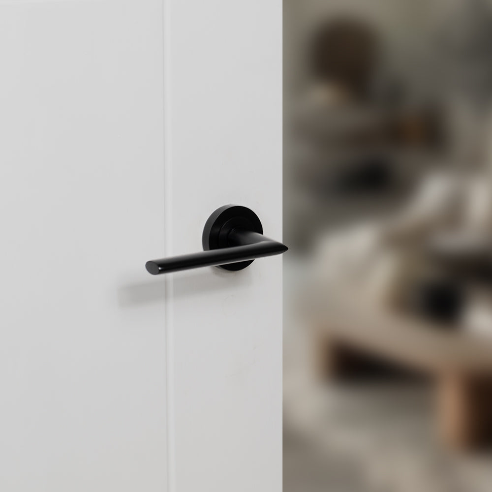 STATUS Alabama Lever Door Handle on Round Rose