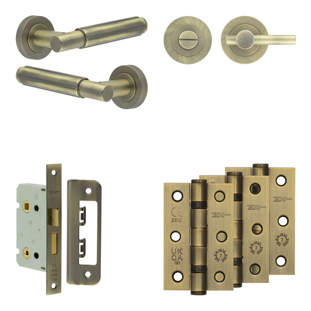 Complete Bloom Door Handle Pack - Bathroom - Antique Brass - 65mm / 3" / Easy Thumb Turn & Lock