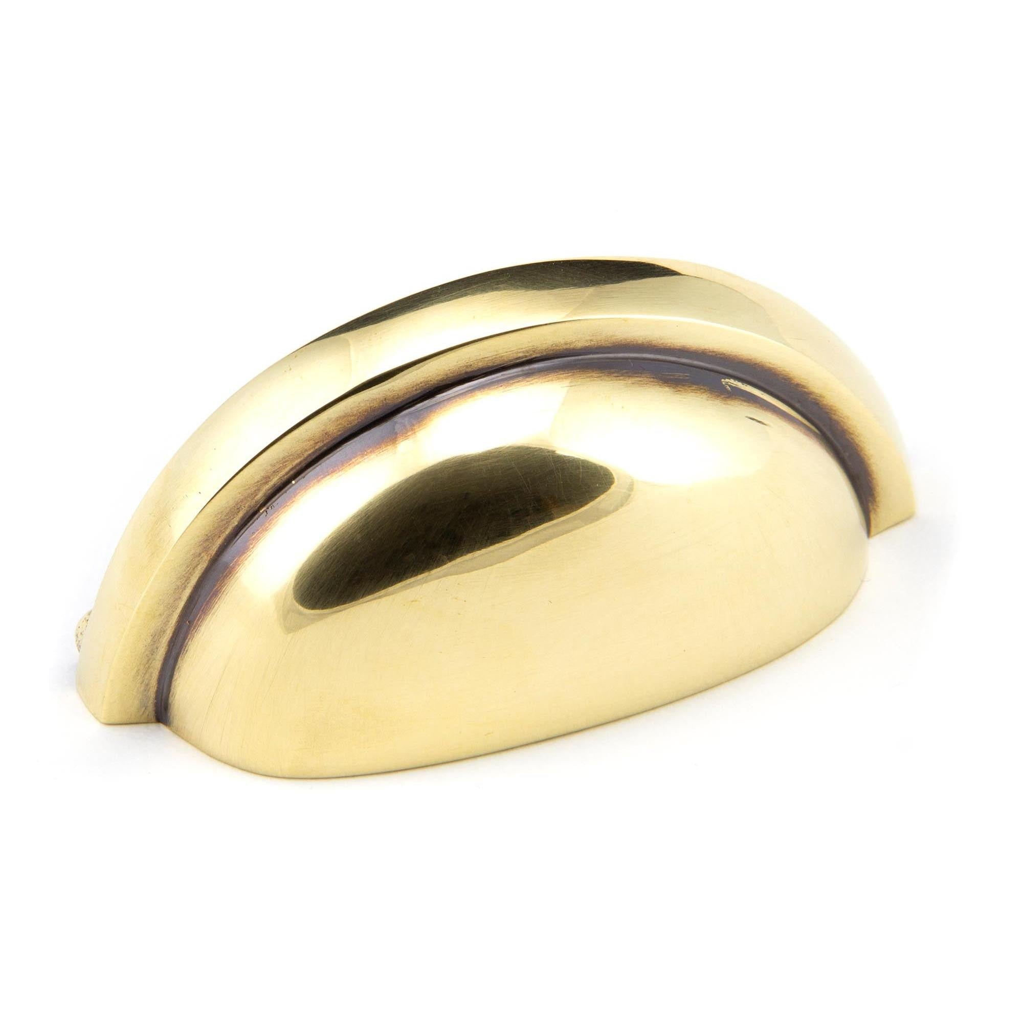 From The Anvil's Aged Brass Regency Concealed Drawer Pull