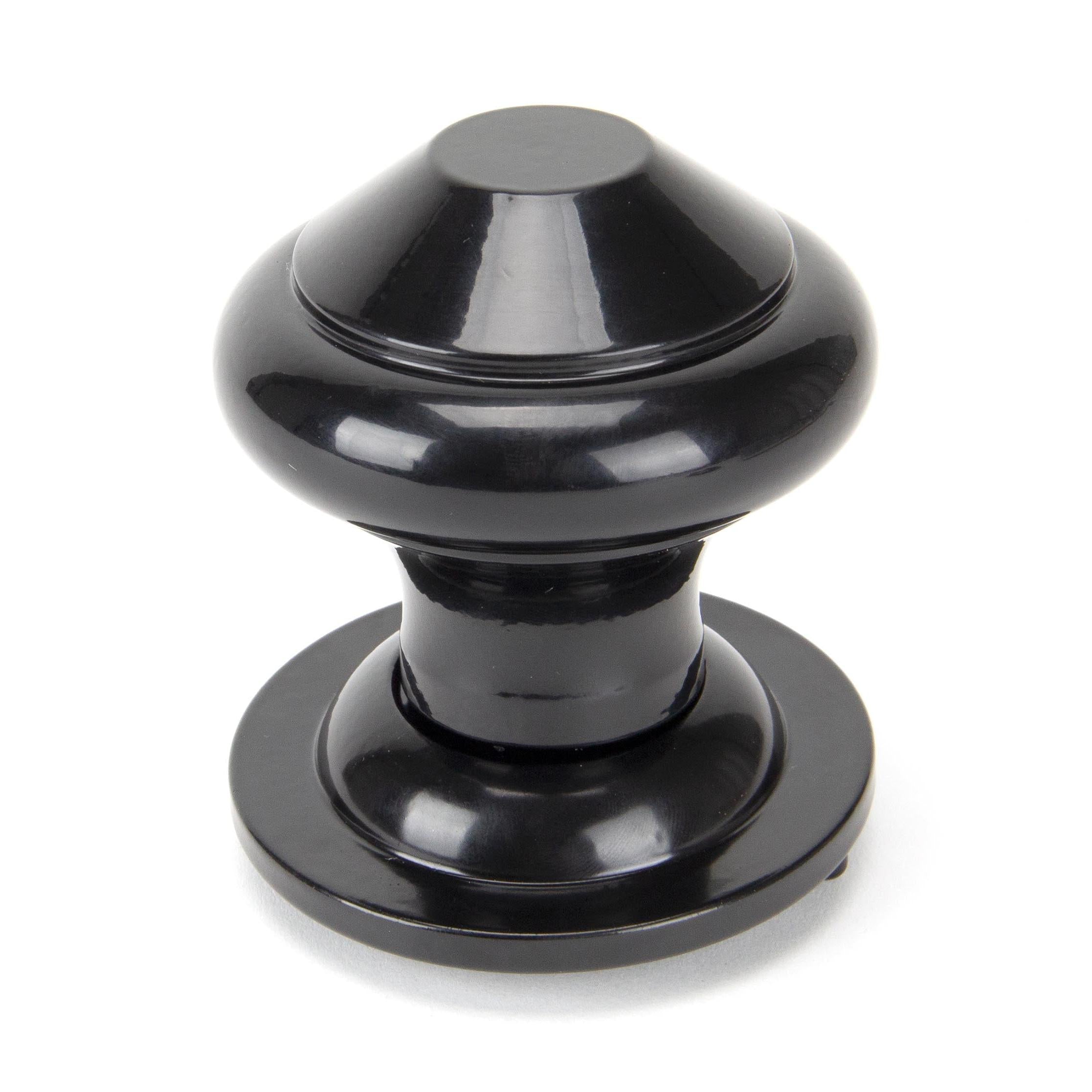 From The Anvil's Black Regency Centre Door Knob