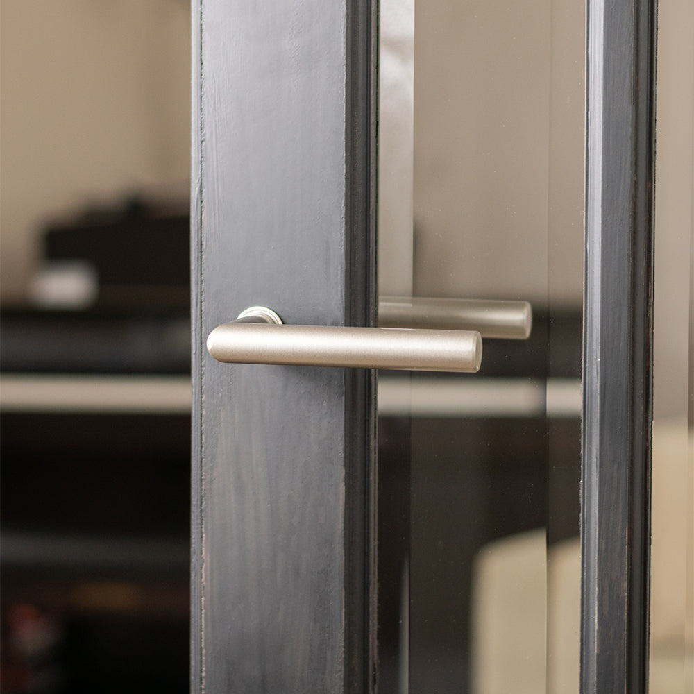 Forme Elle Lever Door Handle on Concealed Round Rose
