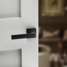Forme Asti Lever Door Handle on Minimal Square Rose