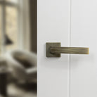 Forme Crystal Lever Door Handle on Minimal Square Rose