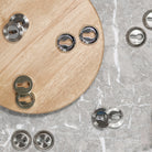 Mediterranean Euro Escutcheons on Round Rose - Satin Nickel/