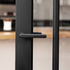 Millhouse Brass Stephenson Lever Door Handle on Concealed Round Rose