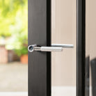 Millhouse Brass Mason Lever Door Handle on Concealed Round Rose
