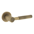 Millhouse Brass Mason Knurled Lever Door Handle on 5mm Slimline Round Rose - Yester Bronze