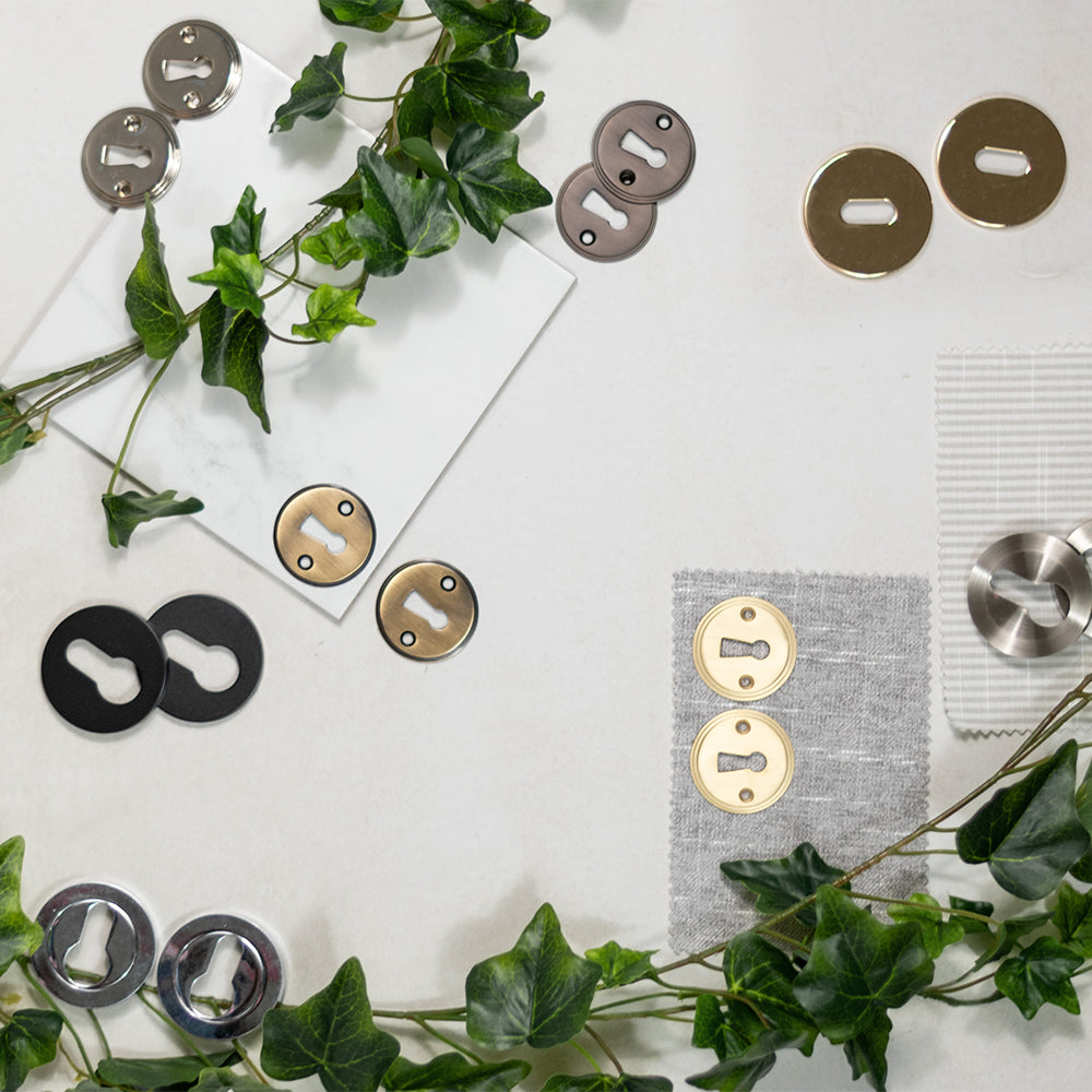 Millhouse Brass Key Escutcheons on Round Rose