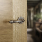 Old English Durham Lever Door Handle on Round Rose