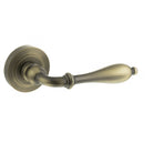 Old English Wrexham Lever Door Handle on Round Rose - Matt Antique Brass