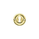 Old English Solid Brass Open Key Hole Escutcheons - Raw Brass