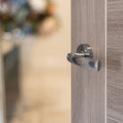 STATUS Nevada Lever Door Handle on Round Rose