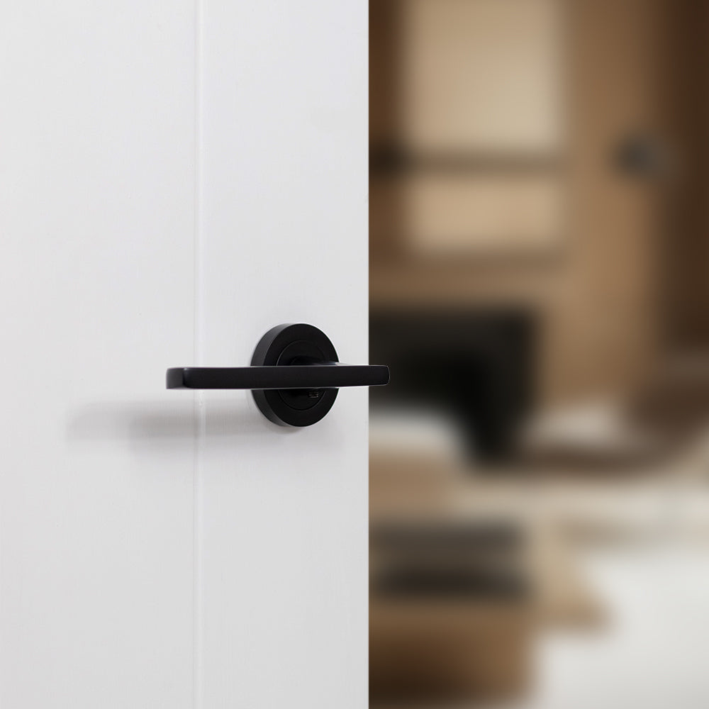 STATUS Alaska Lever Door Handle on Round Rose