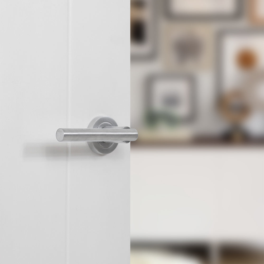 STATUS Nebraska Lever Door Handle on Round Rose