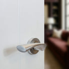 STATUS Colorado Lever Door Handle on Round Rose