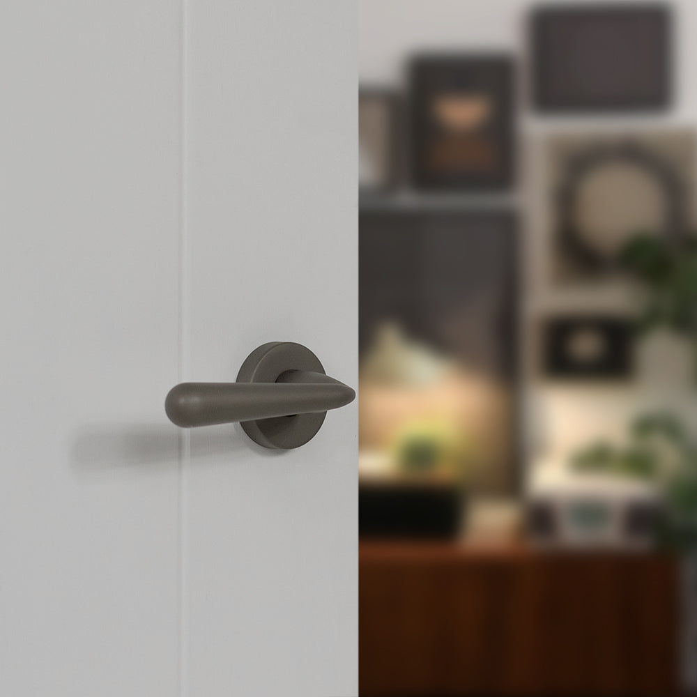 Tupai Rapido CurvaLine Adra Lever Door Handle on Round Rose