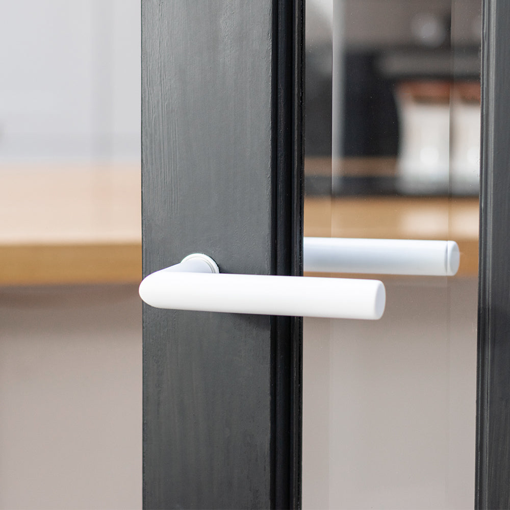 Tupai Rapido Covela Lever Door Handle on Concealed Round Rose - Titanium