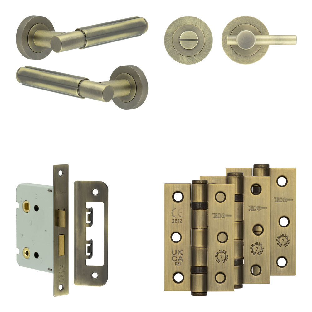 Complete Bloom Door Handle Pack - Bathroom - Antique Brass - 76mm / 3" / Easy Thumb Turn & Lock