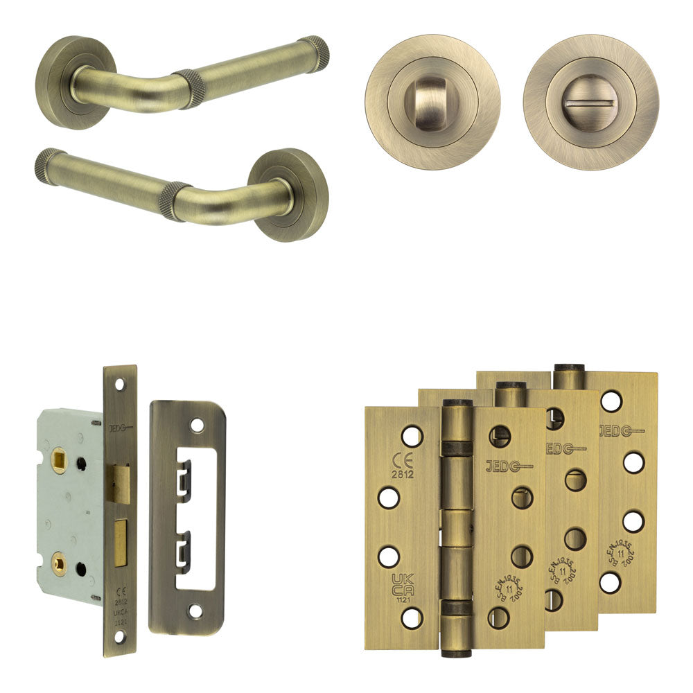 Complete Midtown Door Handle Pack - Bathroom - Antique Brass - 65mm / 4" / Designer Round Turn & Release
